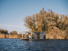 AquaHome - NP de Biesbosch - Bijzonder overnachten op een houseboat!